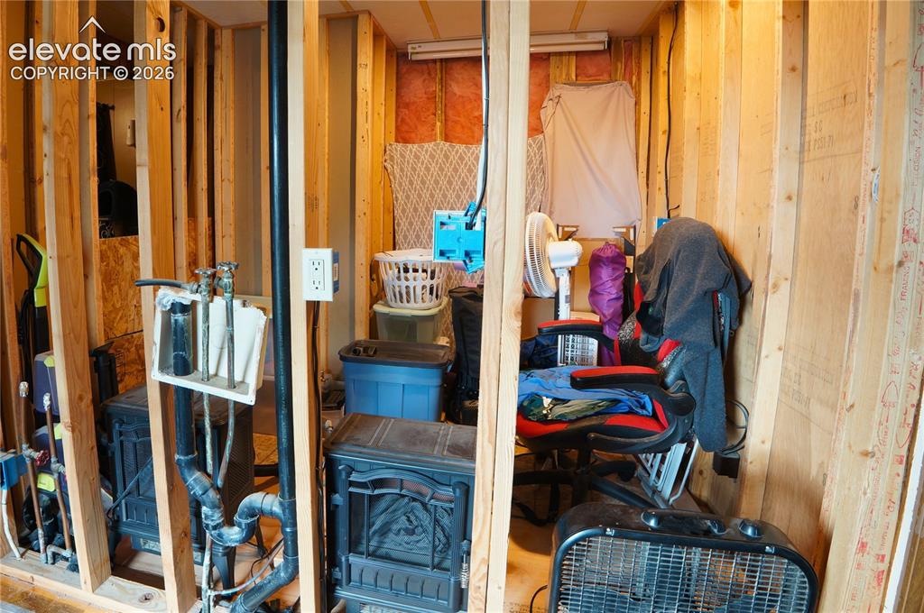 Image 22 of 47: Unfinished Bathroom Framed & Electrical Installed