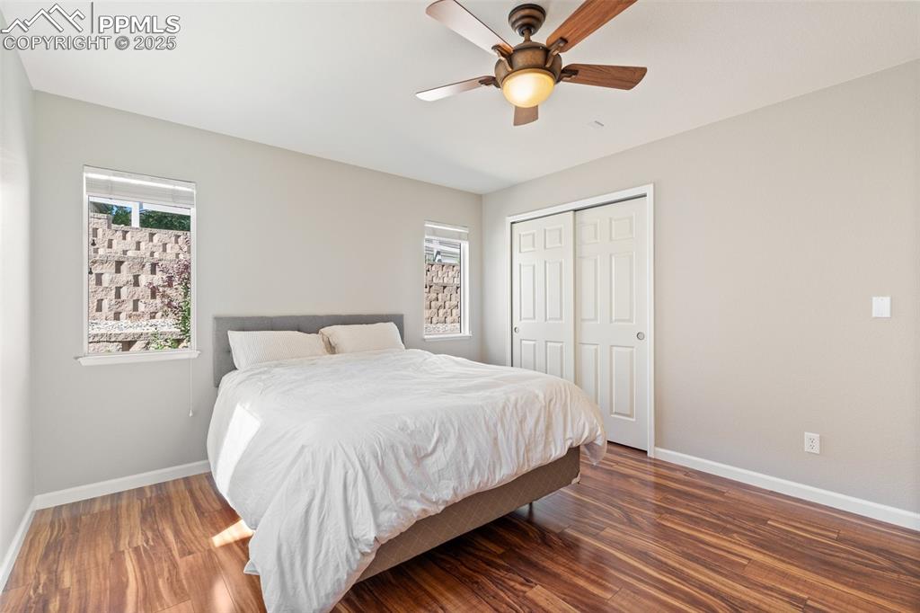 Image 16 of 38: Ceiling fan and new luxury vinyl plank flooring