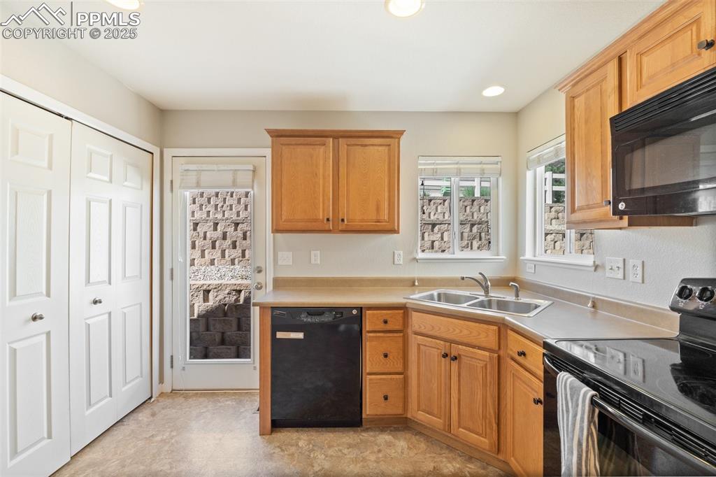 Image 9 of 38: Double door pantry off the kitchen