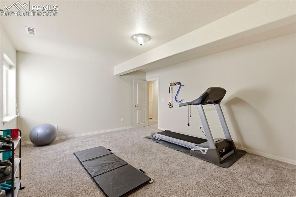 Image 38 of 48: Basement Bedroom