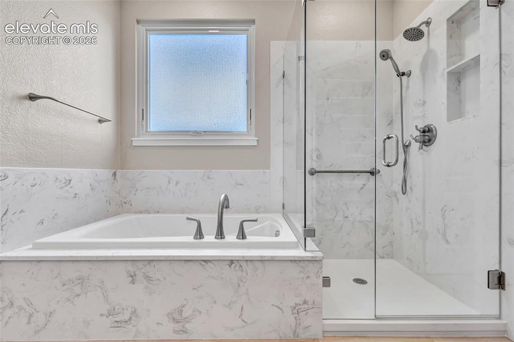 Image 27 of 50: Primary Bath Heated floor and Heated tub to maintain constant water temp