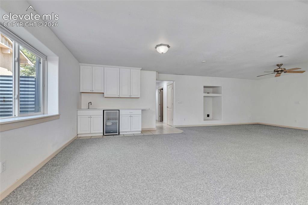 Image 35 of 50: Rec Room With wet bar