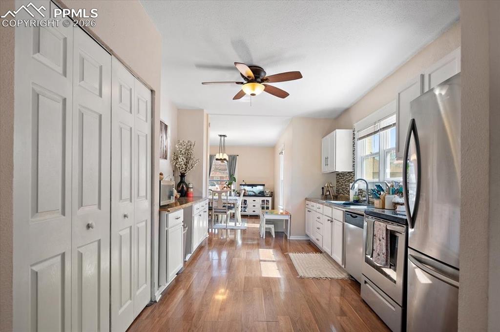 Image 11 of 40: Kitchen to Dining