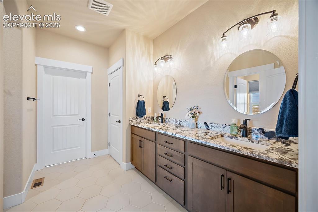 Image 18 of 50: Master Bathroom