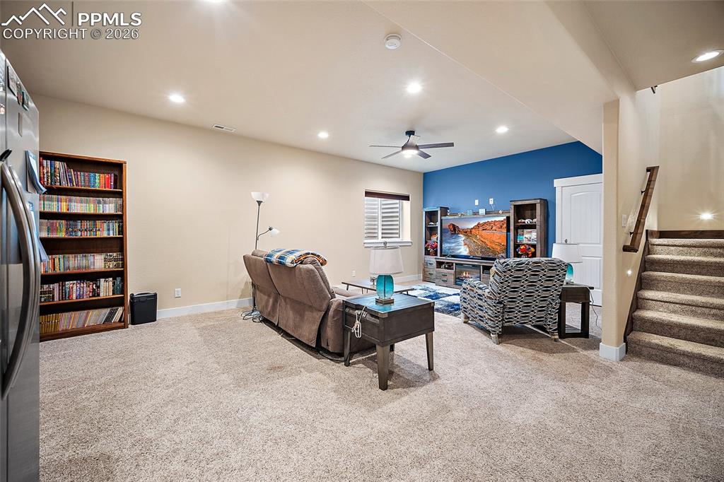 Image 26 of 49: Lower level family room.