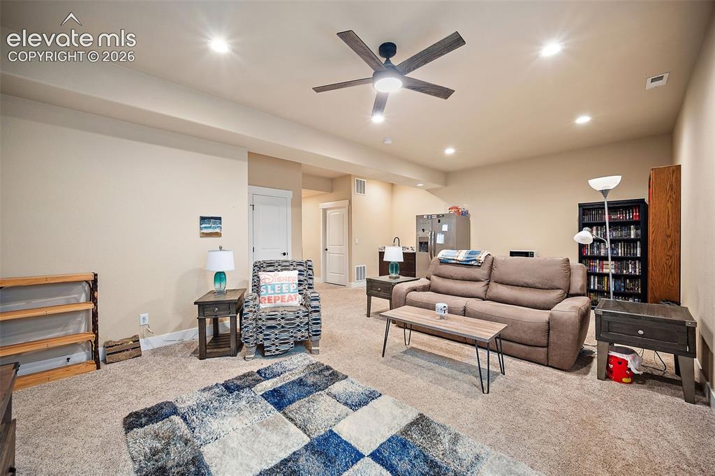 Image 31 of 50: Lower level family room