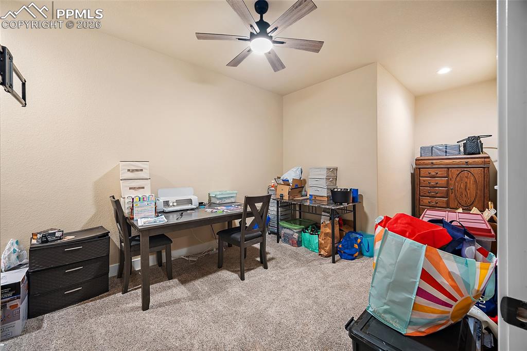 Image 35 of 49: Lower level flex room. Office, crafts, gym.. whatever you need.