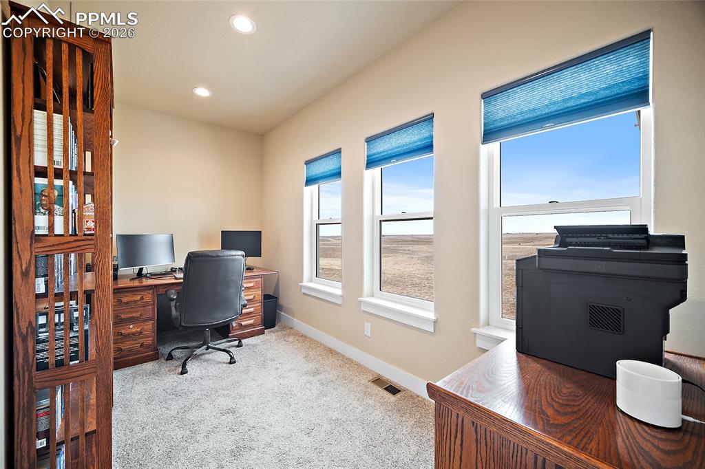 Image 9 of 49: Office off of dining area.