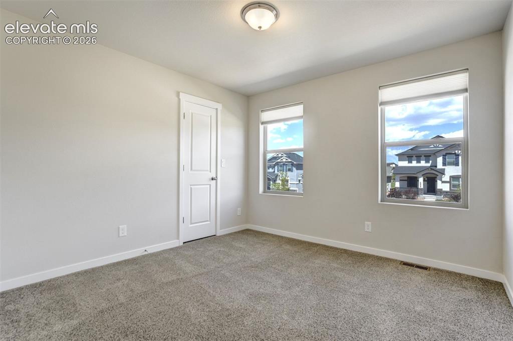 Image 29 of 44: Bedroom 2. Comfortable, bright, and ready for whatever your life needs next