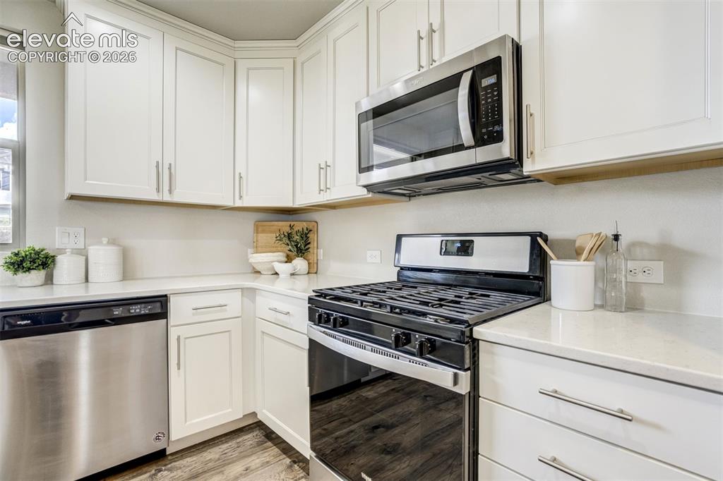 Image 9 of 44: Quartz counters, gas range, and that feeling you made the right decision wi