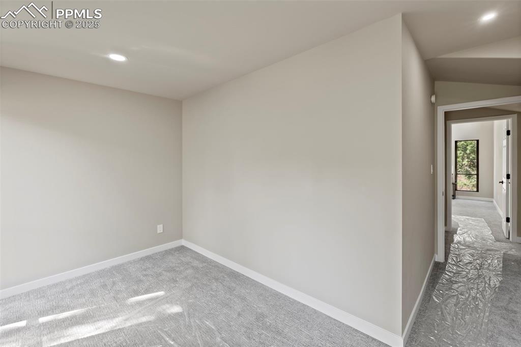 Image 28 of 50: Spare room featuring recessed lighting and carpet flooring