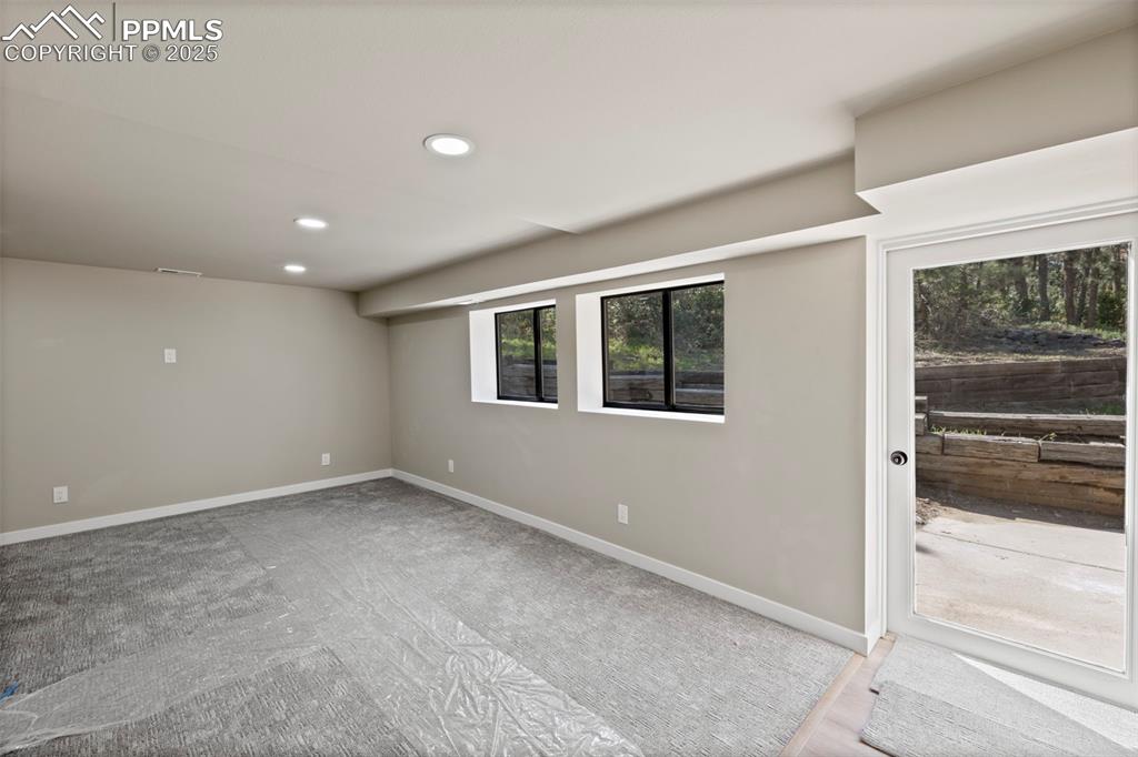 Image 29 of 50: Empty room featuring recessed lighting and baseboards