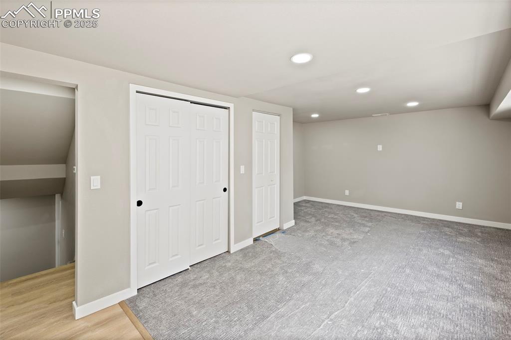 Image 30 of 50: Unfurnished bedroom with recessed lighting and a closet