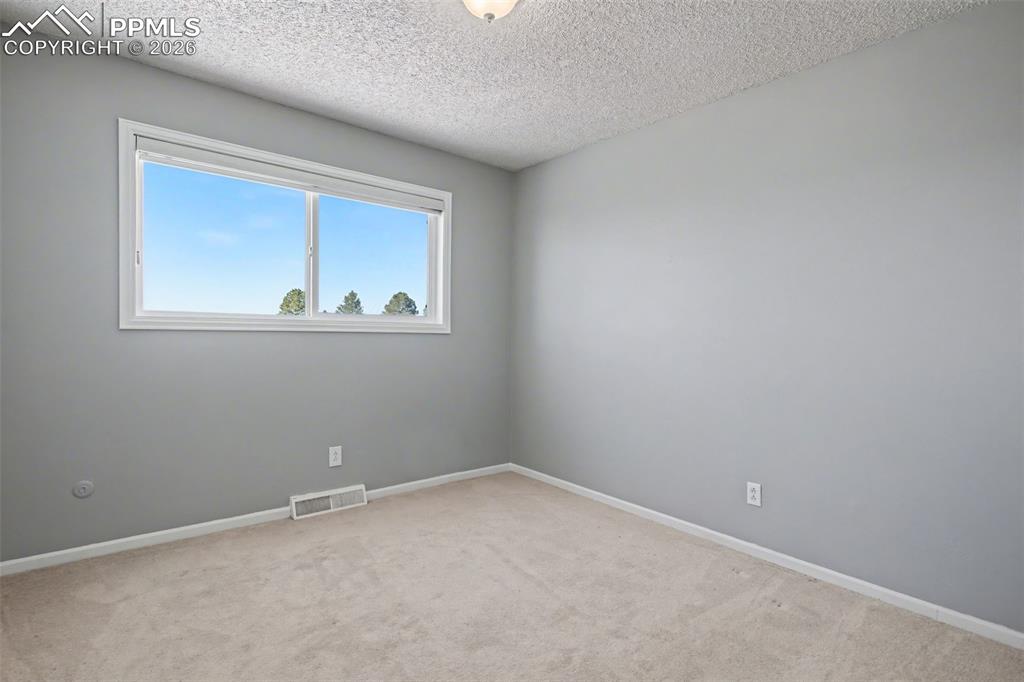 Image 27 of 33: Bedroom