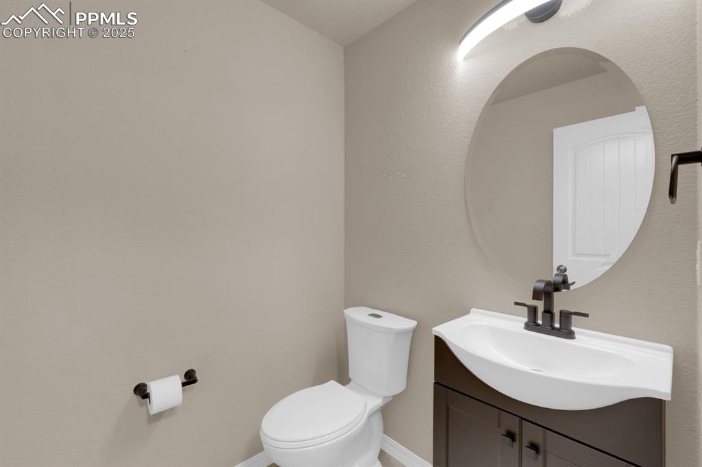 Image 14 of 38: 1/2 Bathroom on main level