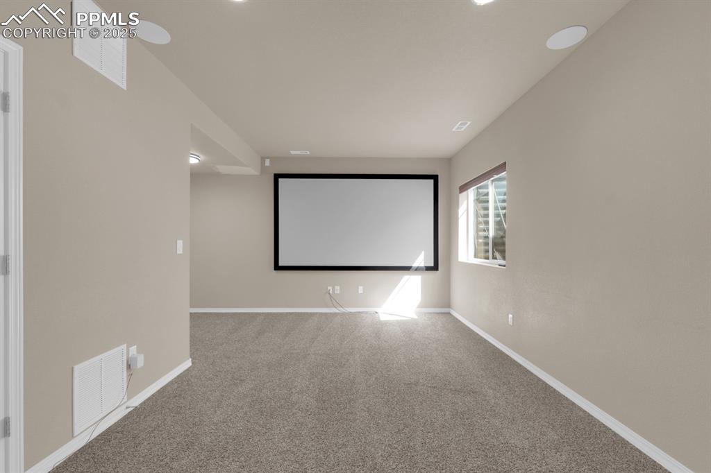 Image 29 of 38: Basement - big screen