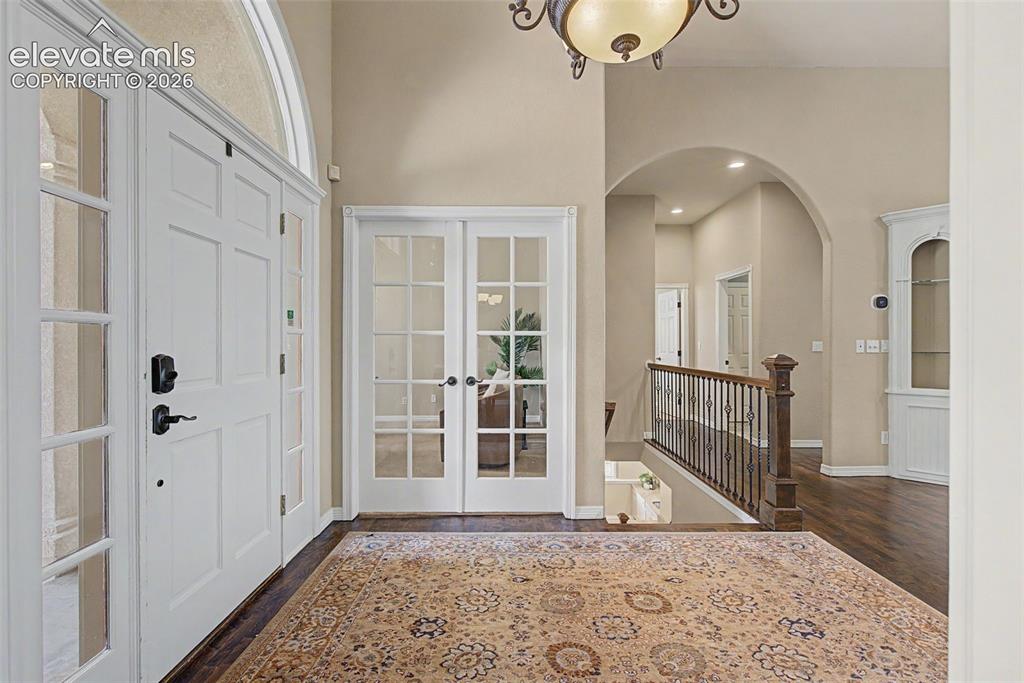 Image 4 of 42: A seamless flow from the entryway highlights the spacious open floorplan an