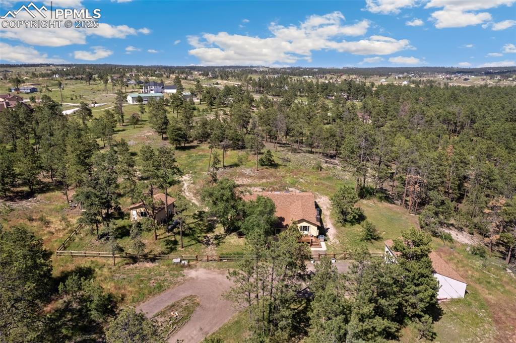 Image 35 of 36: Facing North, showing driveway and all three structures