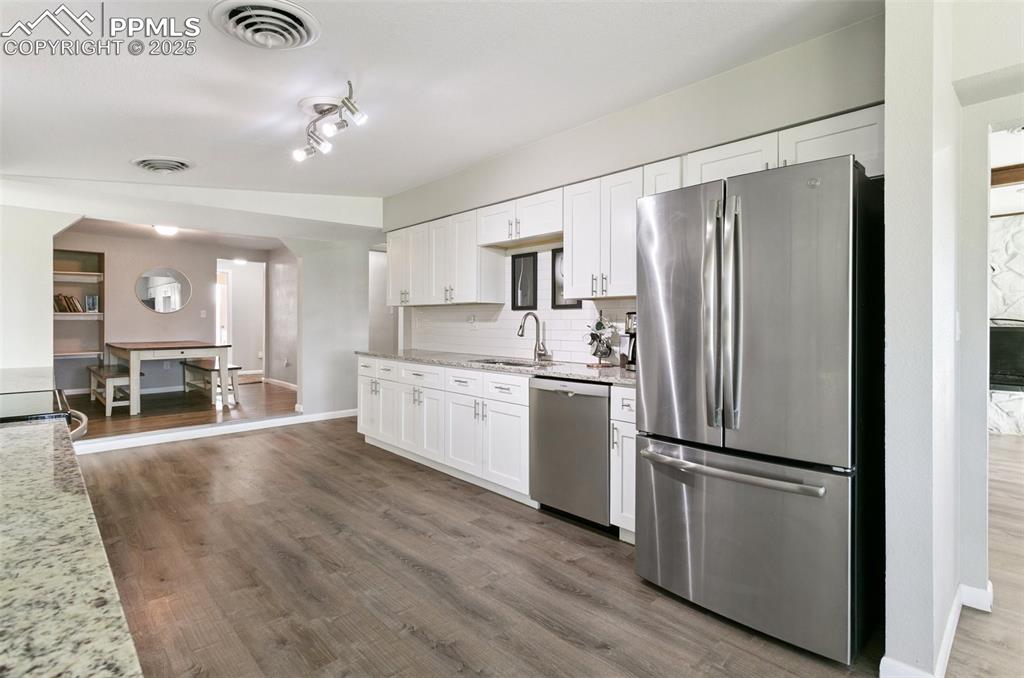 Image 9 of 36: Facing dining room
