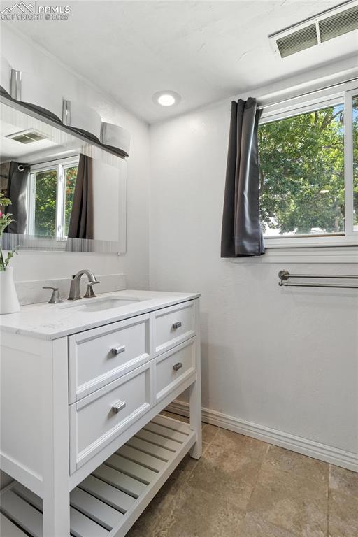 Image 12 of 42: Updated Bathroom