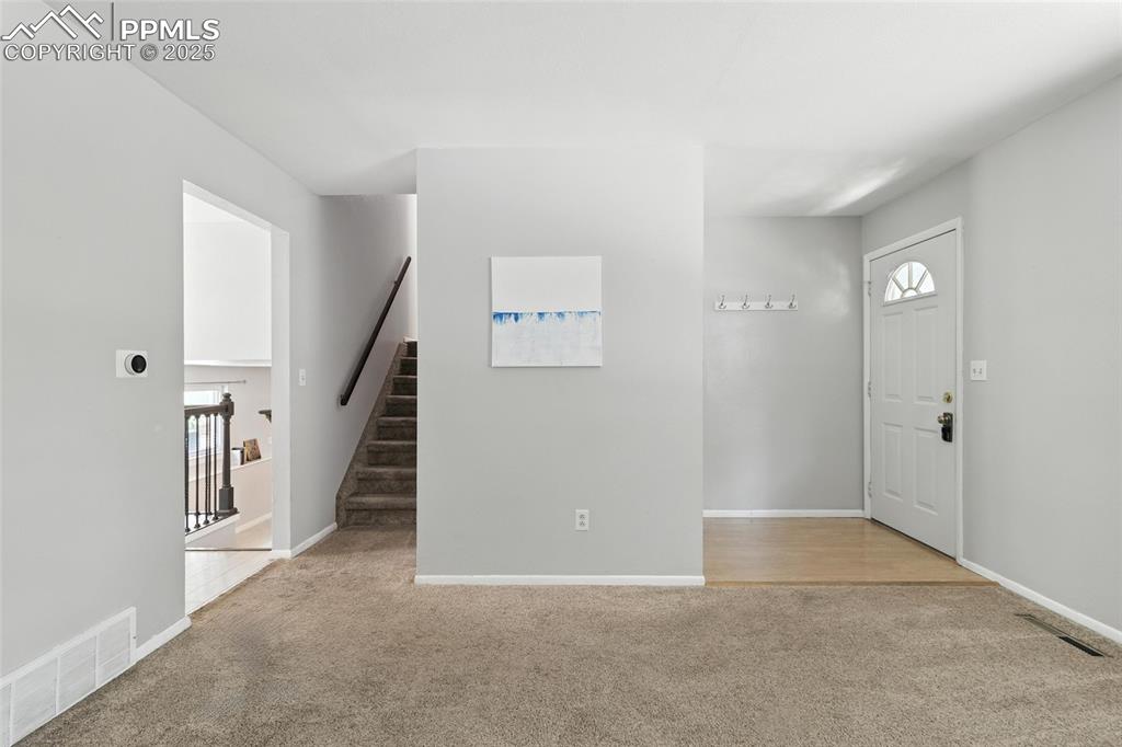 Image 15 of 42: Looking out from Living Room