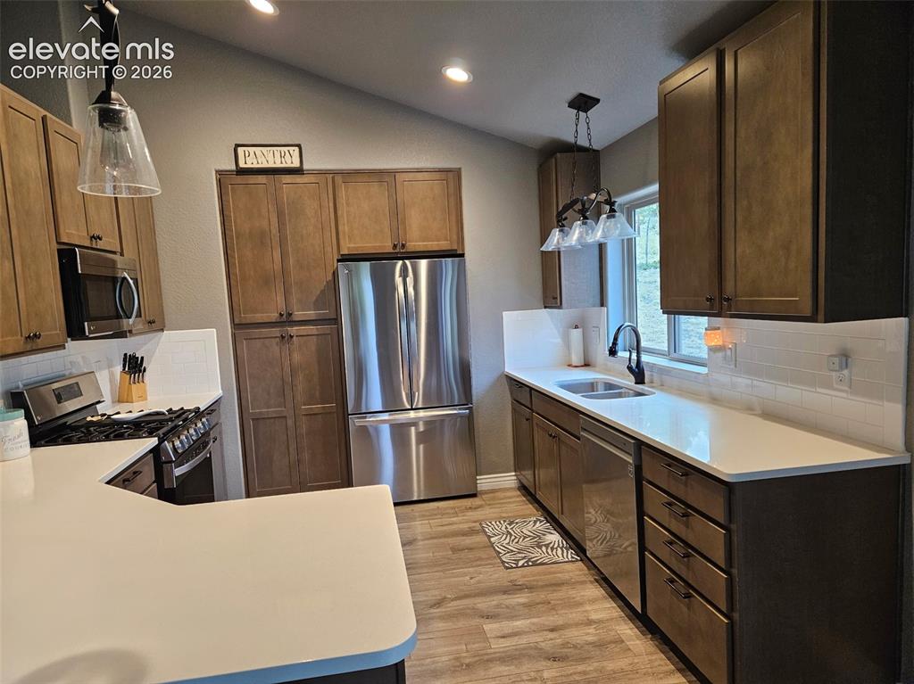 Image 17 of 37: lot of cabinets with a pantry