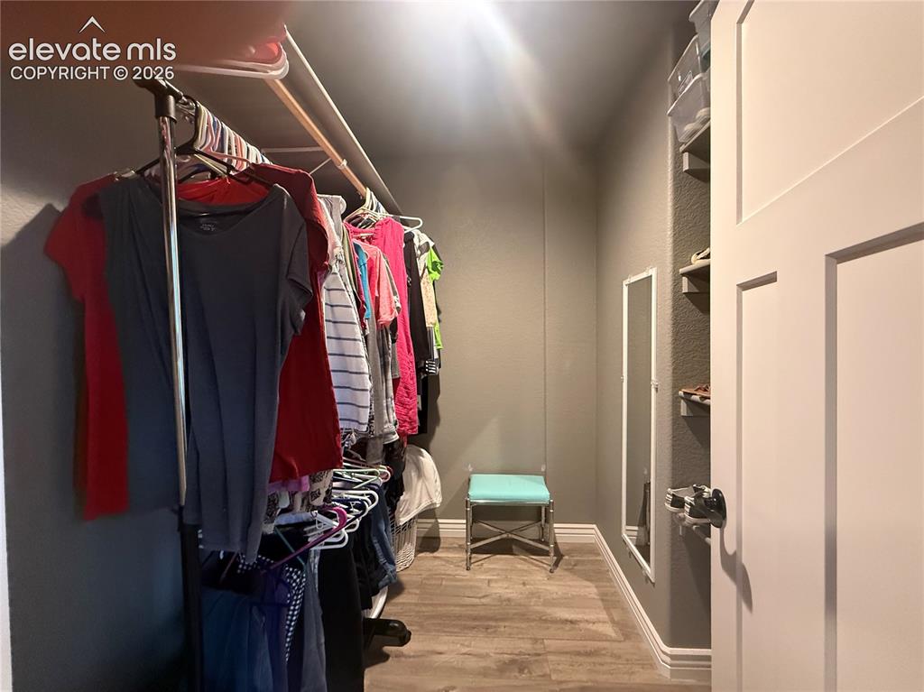 Image 23 of 37: Walk in Closet in Master Bedroom