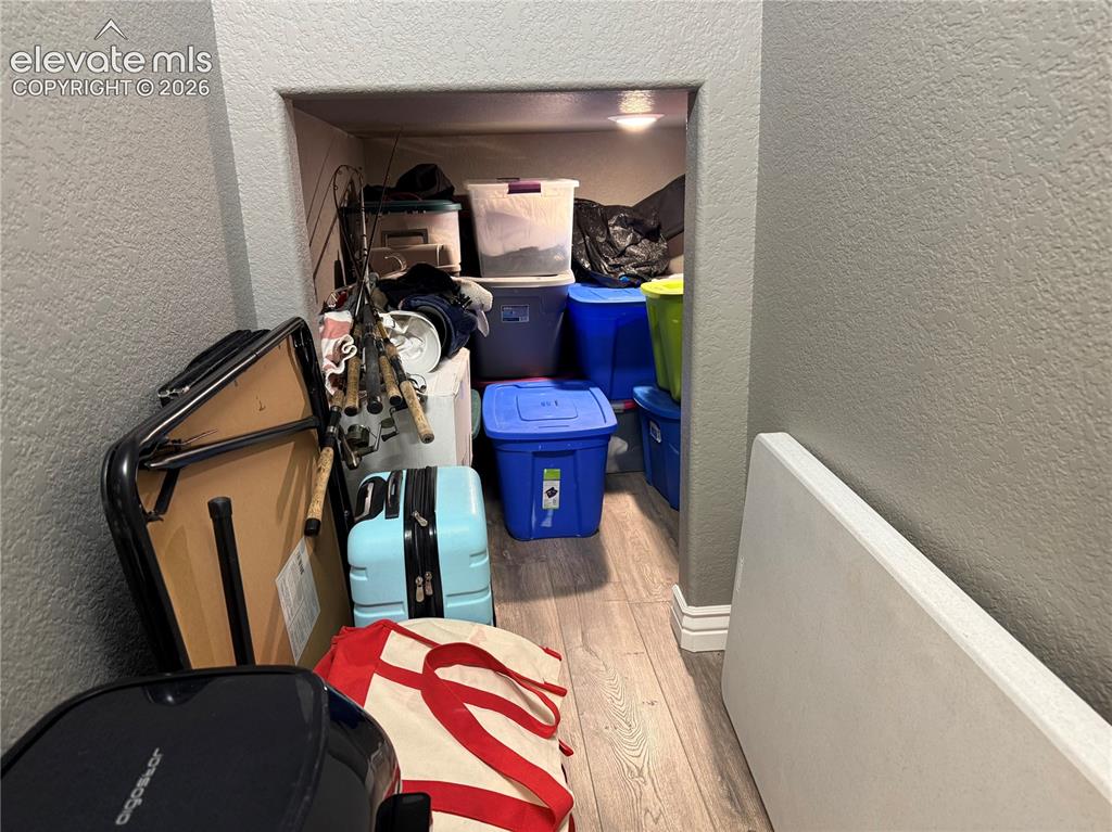 Image 31 of 37: storage under the steps