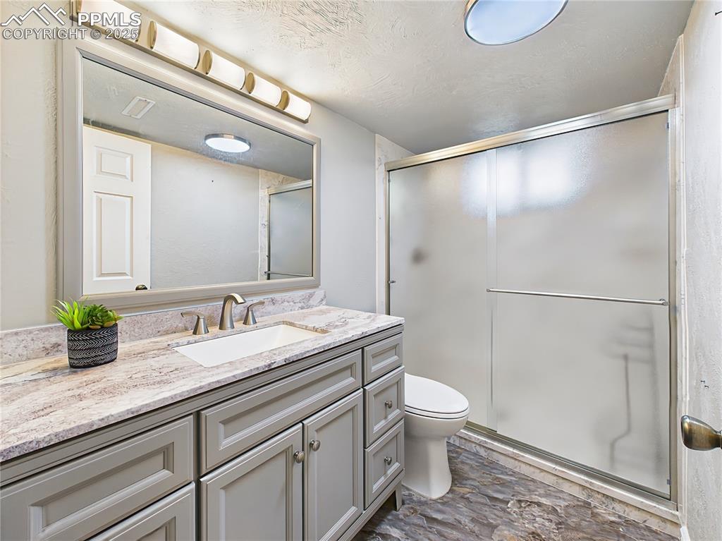 Image 41 of 49: Downstairs Bathroom (2023 Renovation) – Fully renovated in 2023, this moder