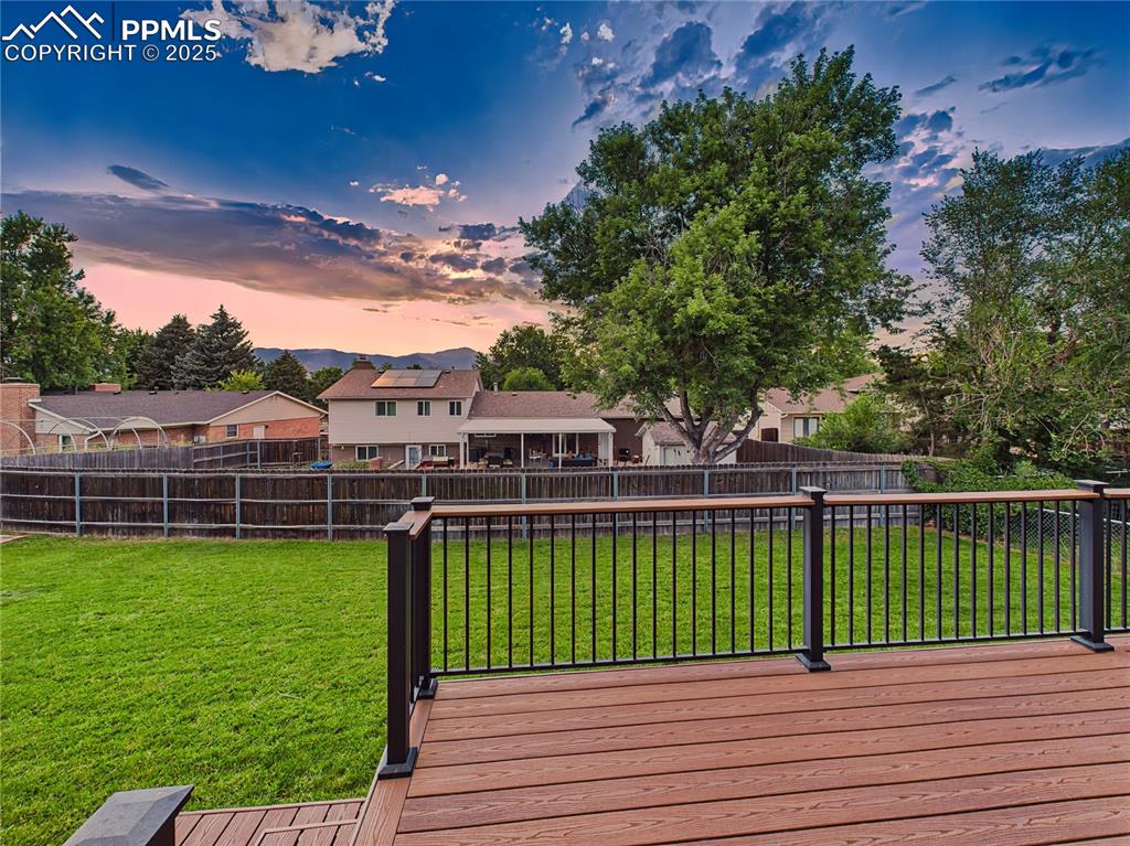 Image 47 of 49: Deck with Mountain Views – Enjoy breathtaking Pikes Peak views from the ele