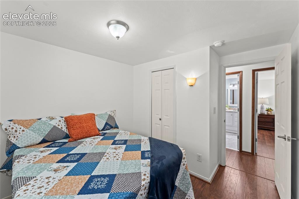 Image 29 of 45: Upper level primary bedroom with walk-in