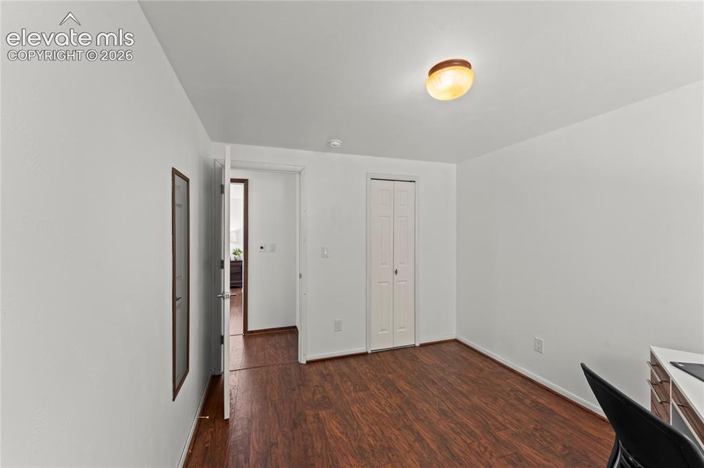 Image 31 of 45: Upper level primary bedroom with walk-in