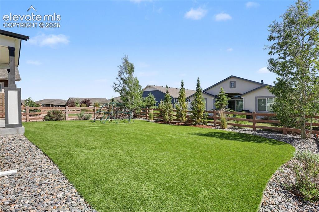Image 47 of 48: Artificial in turf backyard