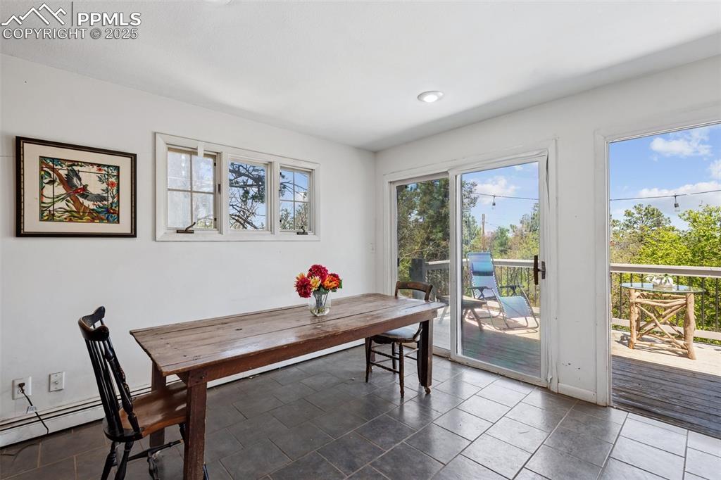 Image 12 of 33: Dining space with baseboards