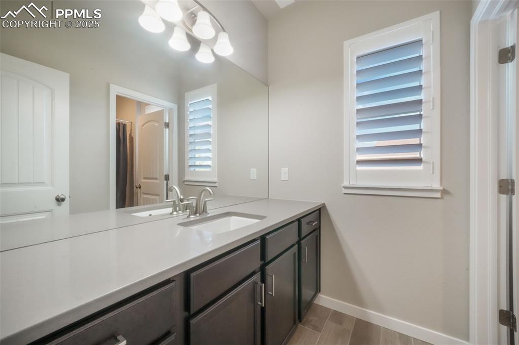 Image 23 of 50: Upper Level Hall Bathroom