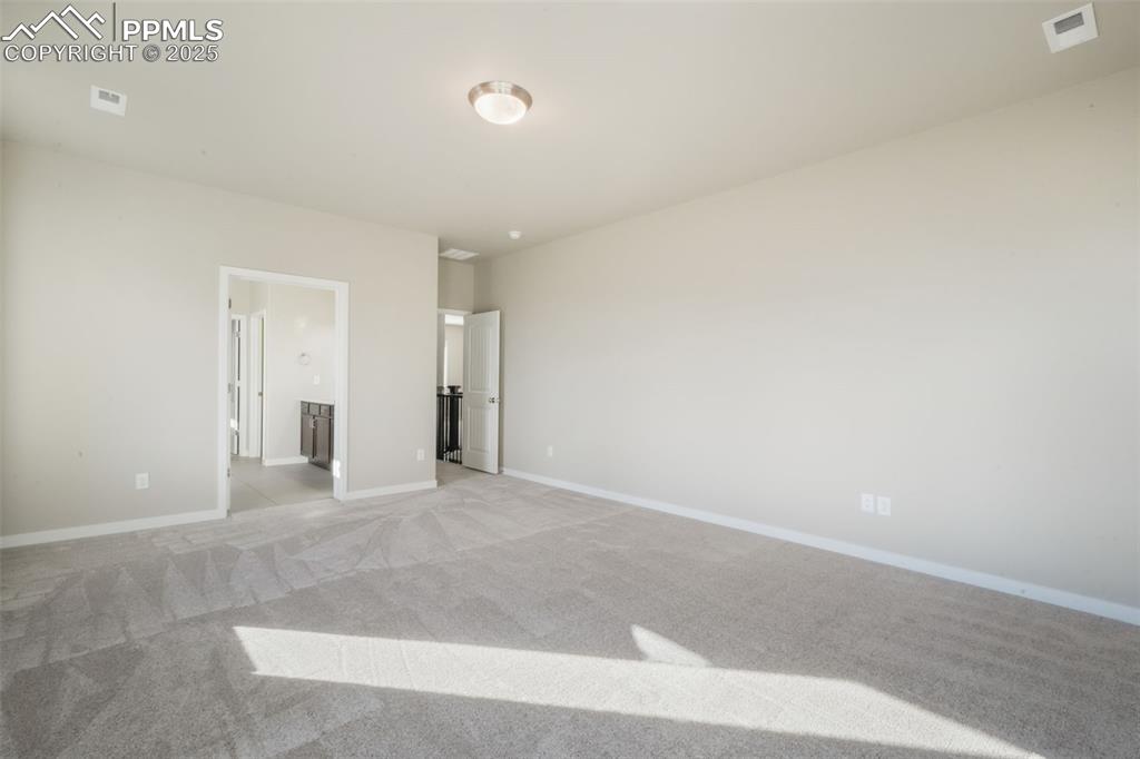 Image 30 of 50: Master Bedroom