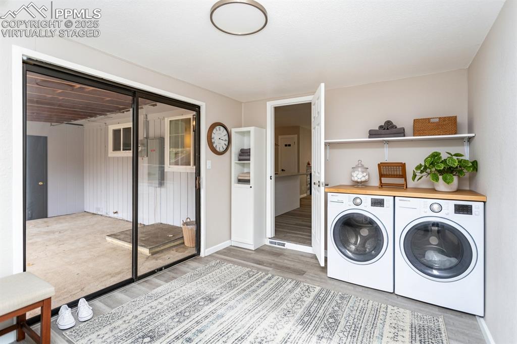 Image 37 of 50: Virtually Staged laundry room-washer and dryer are not included.  It has ro