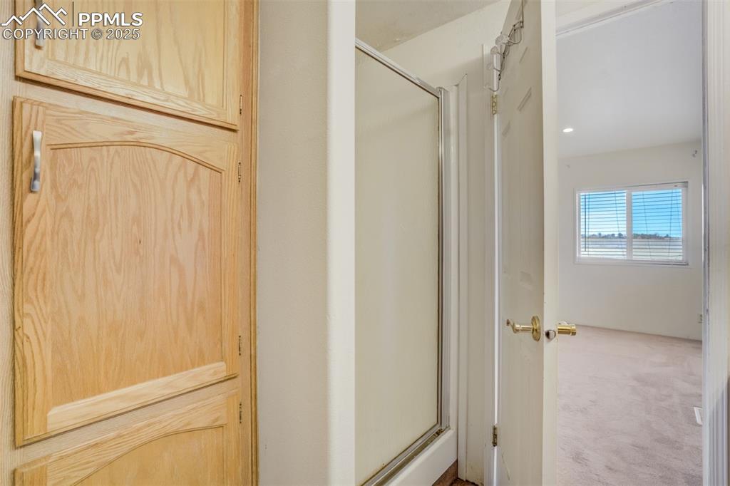 Image 26 of 50: Full bath featuring a shower stall