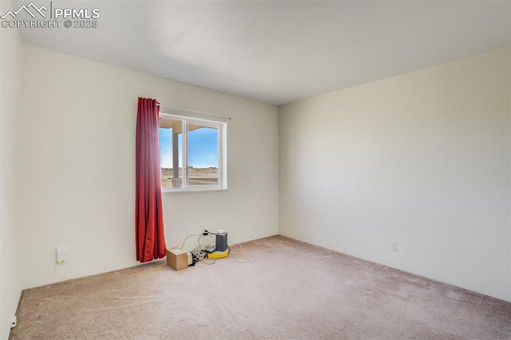 Image 32 of 50: Spare room with carpet