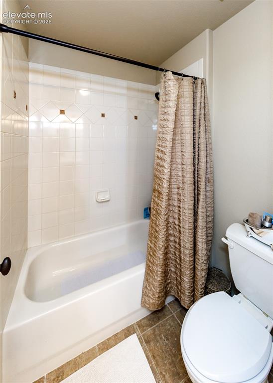 Image 32 of 50: Attached bath on upper level