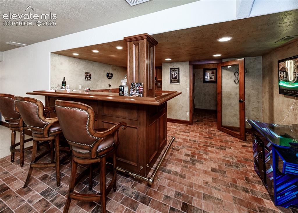 Image 38 of 50: Irish Pub style bar and Wine Cellar