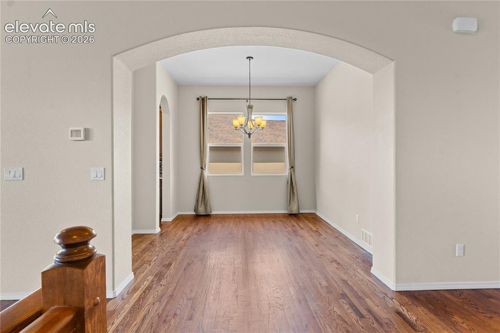 Image 14 of 37: The dining space can accomodate a large table.
