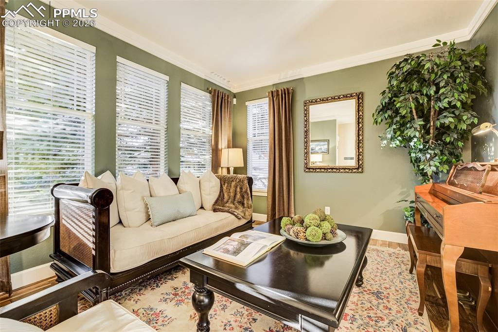 Image 16 of 50: Gorgeous Formal Living Room is inviting and versatile