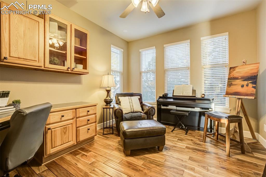 Image 19 of 50: Large office with plenty of room for hobbies as well