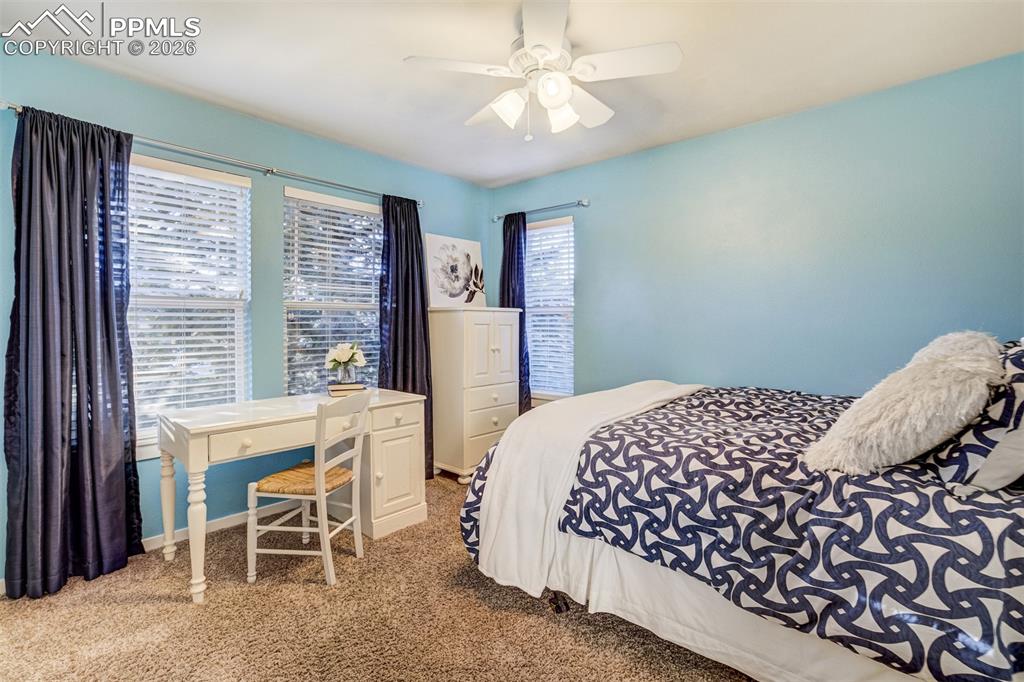 Image 26 of 50: A second bedroom on upper level