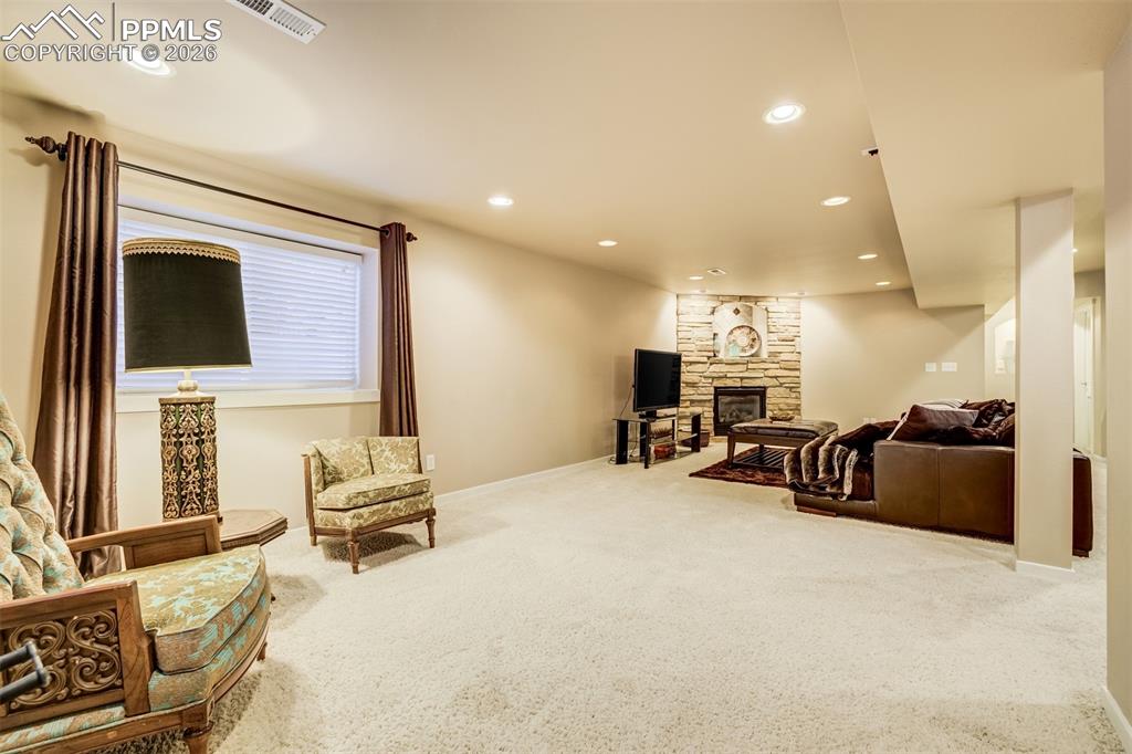 Image 37 of 50: A second area in basement offers so many options for use!