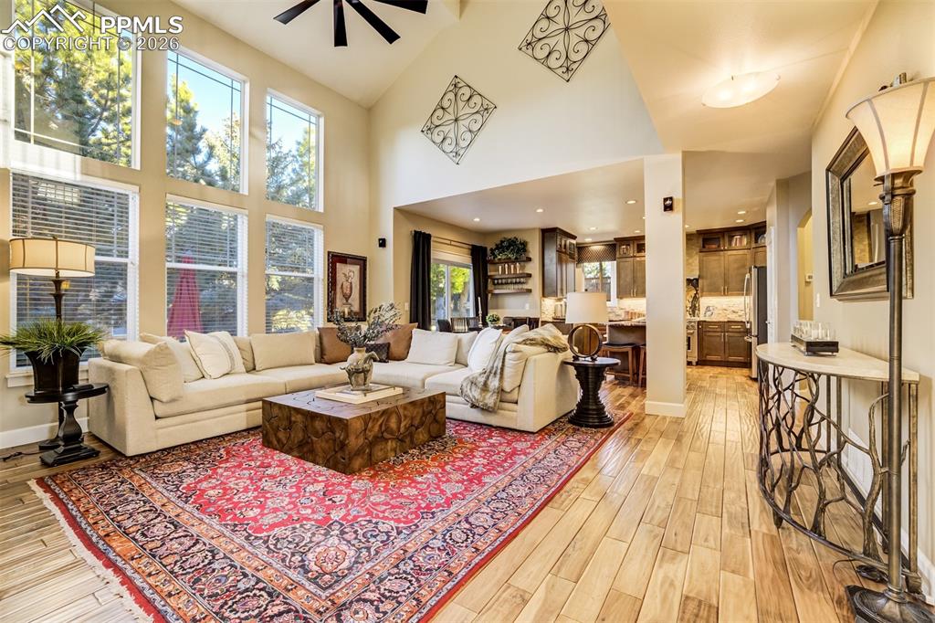 Image 4 of 50: Soaring ceiling and floor to ceiling windows provide gorgeous natural light