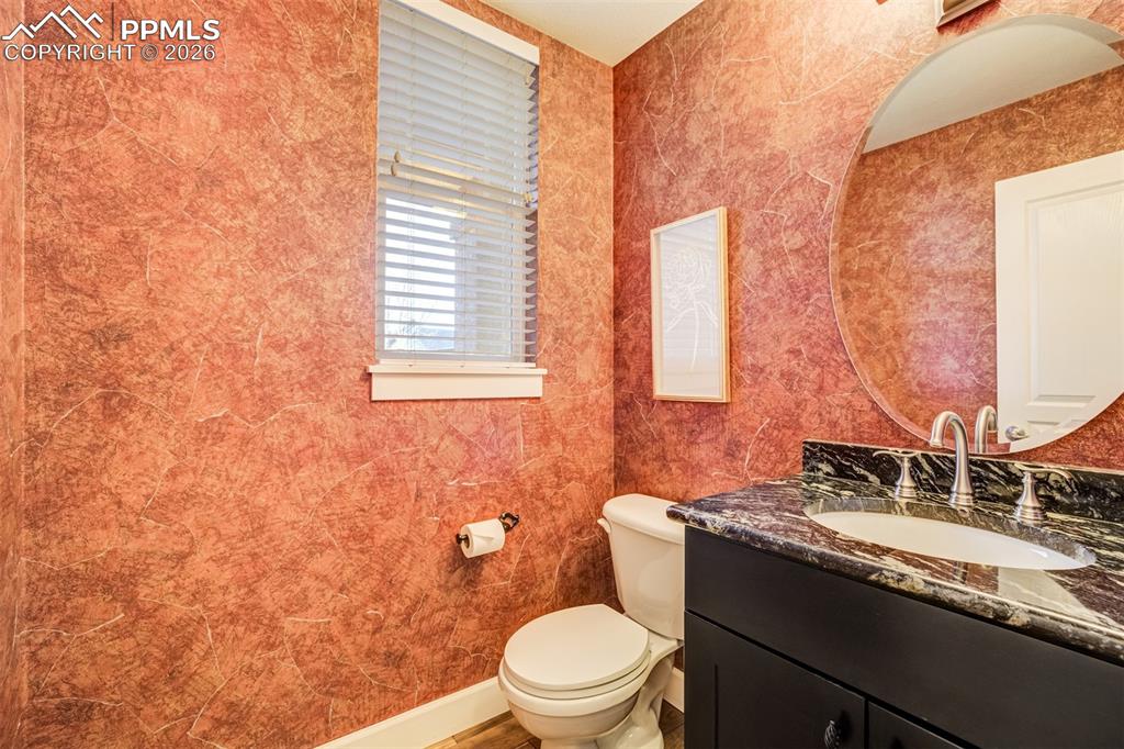 Image 43 of 50: Main level laundry with cabinetry