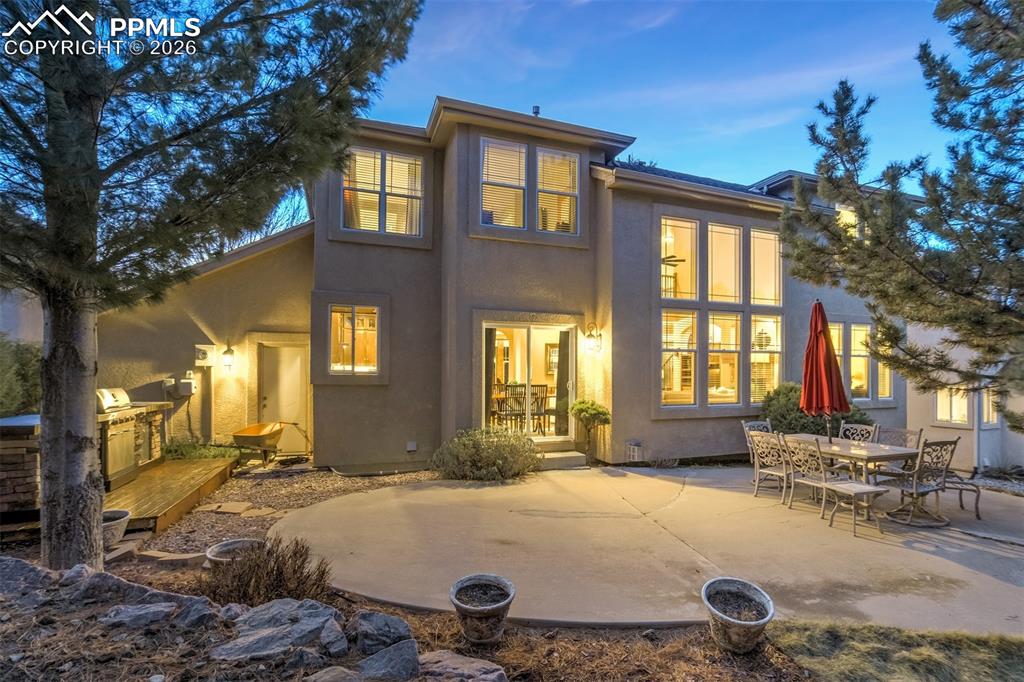 Image 47 of 50: A large back patio is perfect to enjoy Colorado living year round!