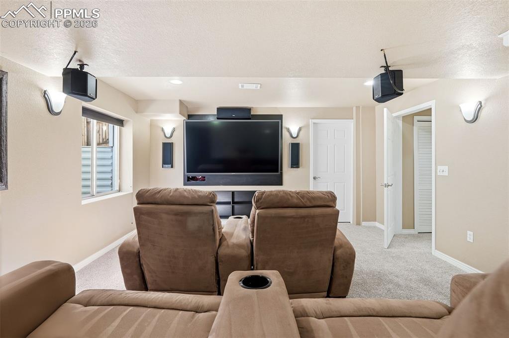 Image 22 of 36: Basement media room